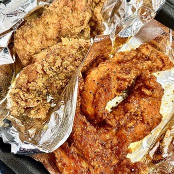 Two tray combo — original and sauced wings at Mac Daddy