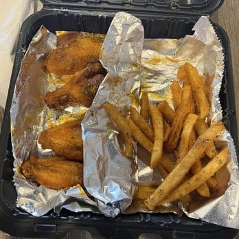 Wings and fries combo tray at Mac Daddy Wingz and Cheeze